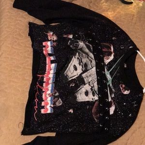 A graphic cropped sweater